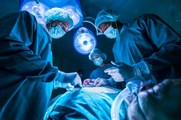 Doctor and Nurses working in surgery room